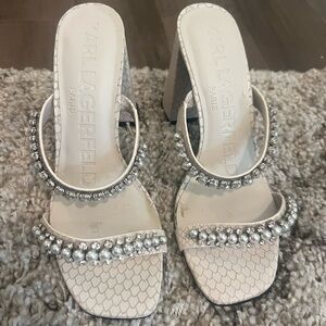 Pearl embellished dress sandals.